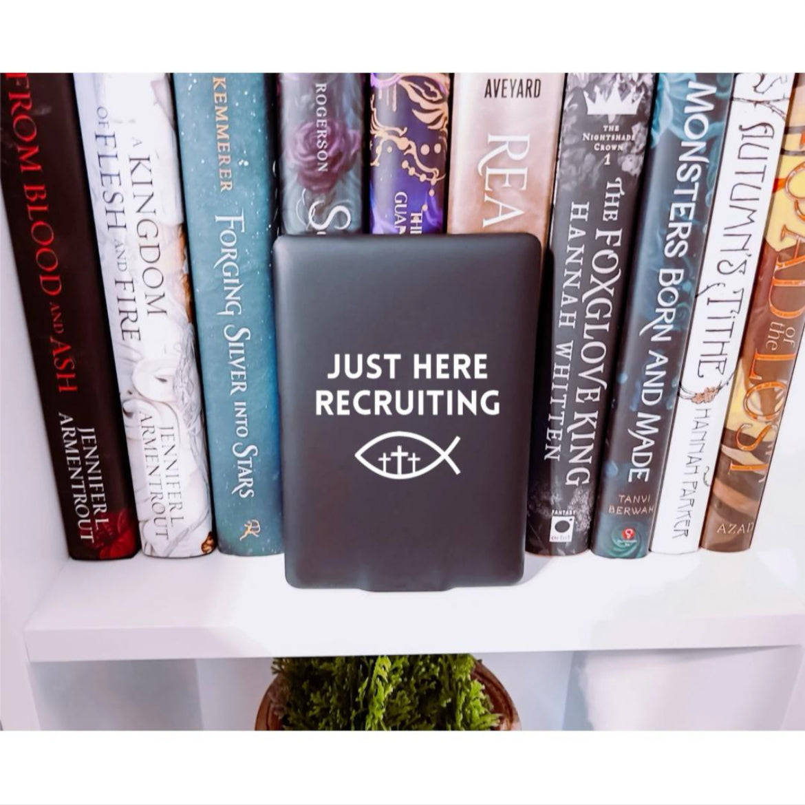 Kindle decal sticker that says, “Just here recruiting” with the ichthus fish symbol with three crosses in the middle. Great for eReaders too.