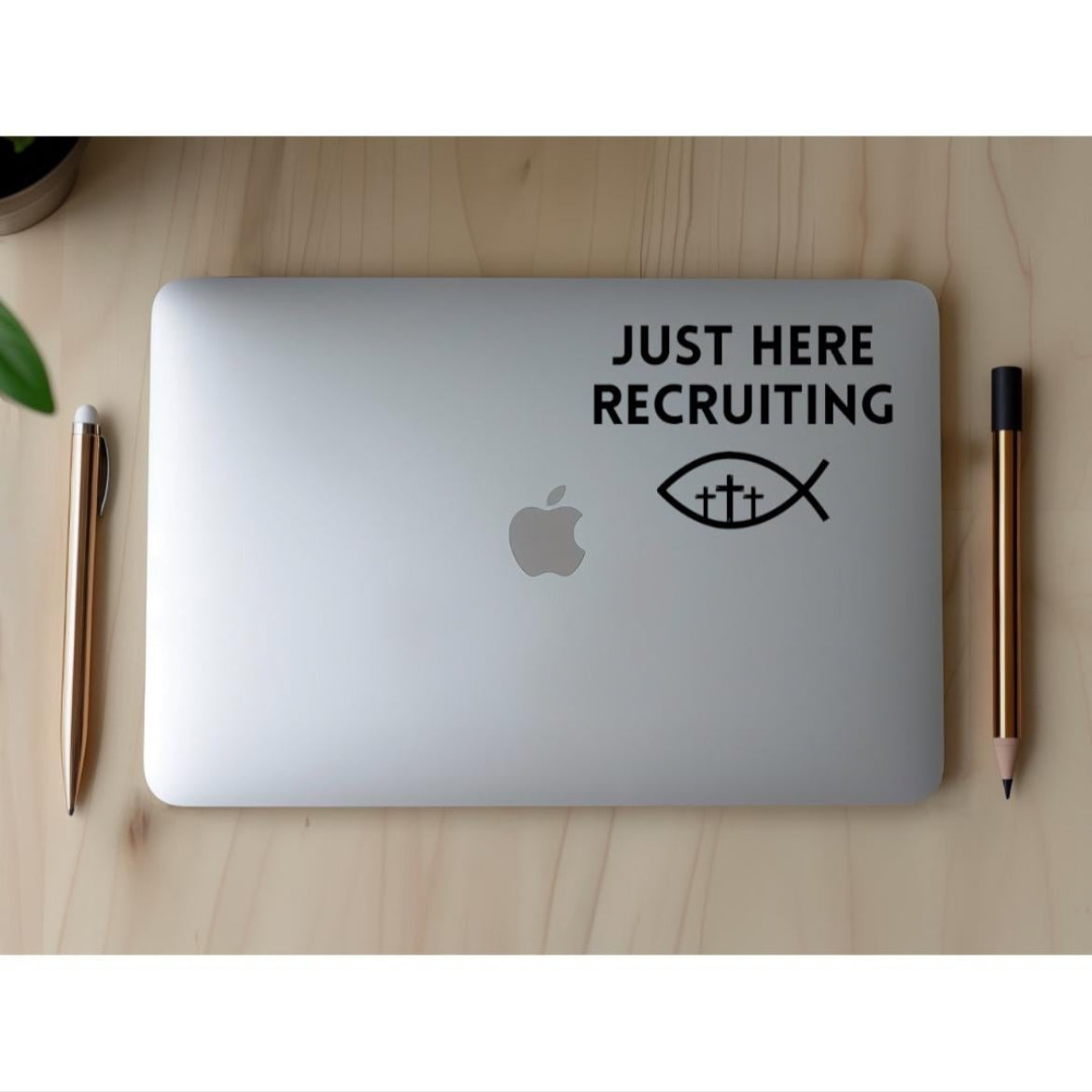 Laptop sticker decal that says, “Just here recruiting” with the ichthus fish symbol with three crosses in the middle.