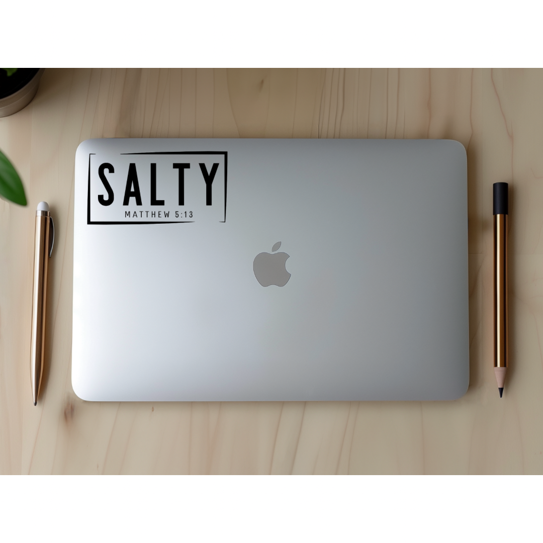 Laptop sticker that says, “Salty Matthew 5:14.”