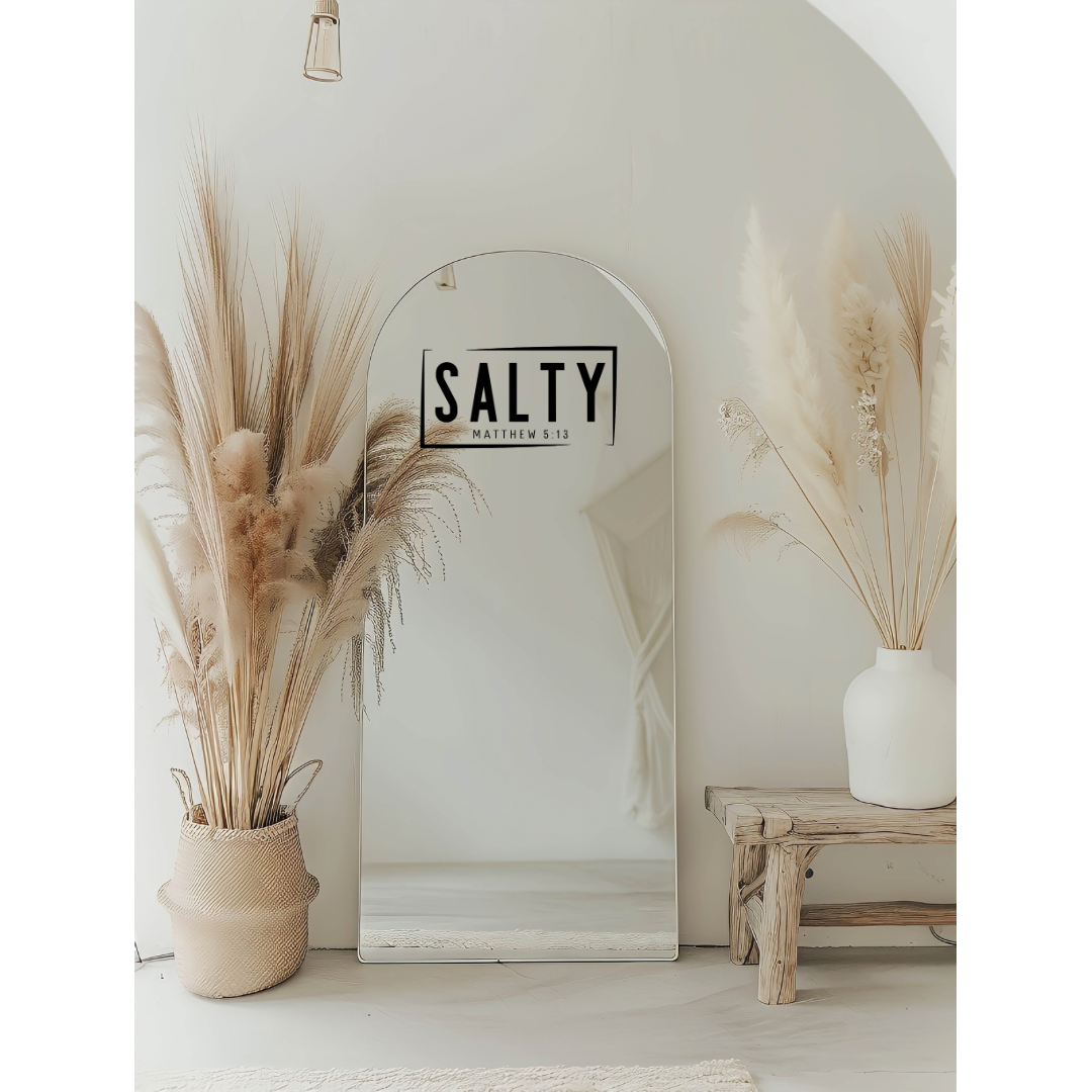 Mirror sticker that says, “Salty Matthew 5:14.”