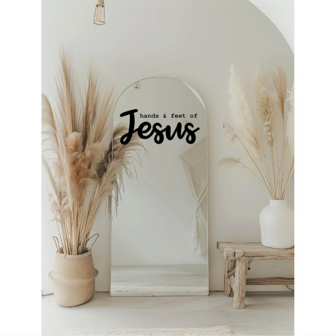 Mirror decal sticker that says, “hands and feet of Jesus”. The word “Jesus” is in large cursive letters.