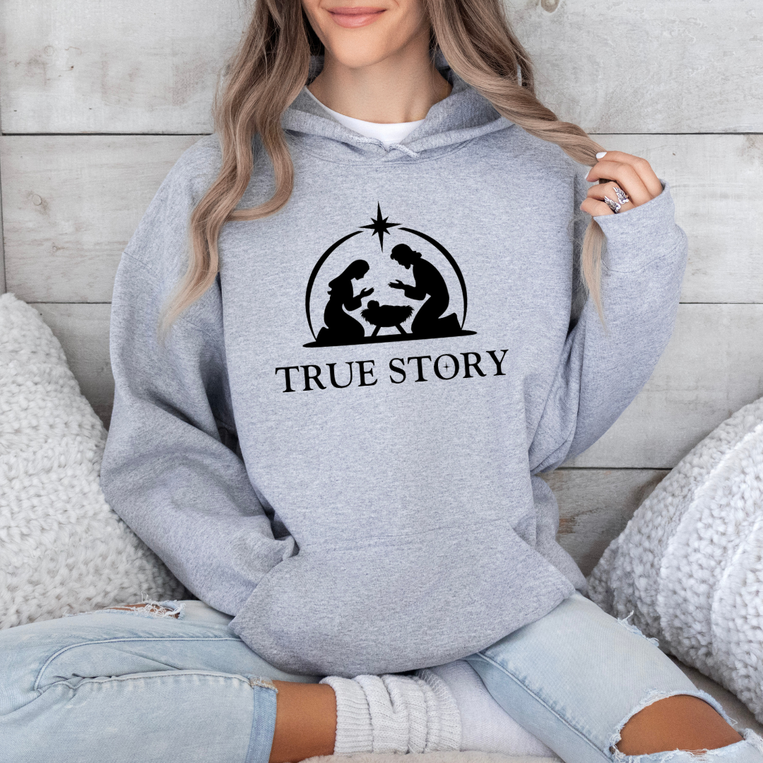 Gray Hoodie Christmas sweatshirt that says, "true story" featuring Jesus, Mary and Jesus in a manger.