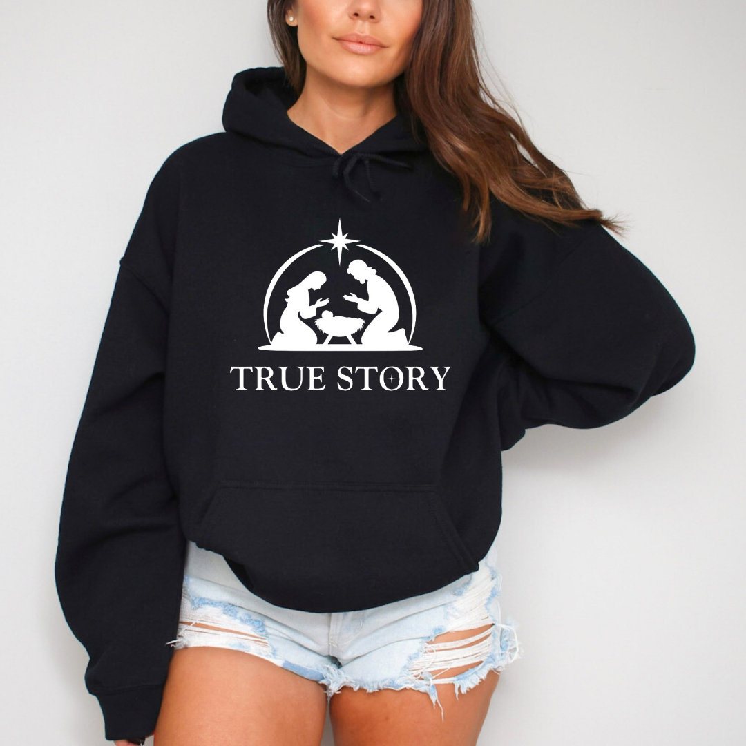 Black hoodie Christmas sweatshirt that says, "true story" featuring Jesus, Mary and Jesus in a manger.