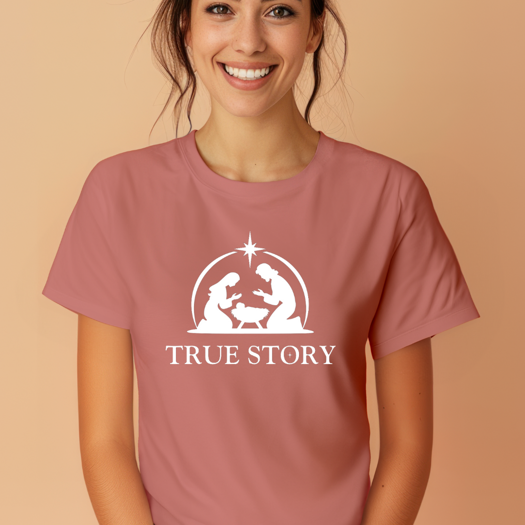 Mauve crewneck t-shirt that says, “true story” with Mary, Joseph and baby Jesus in a manger. Christian Christmas Holiday attire.