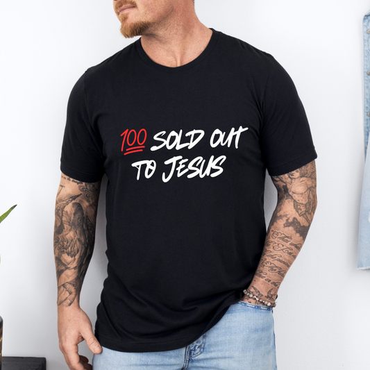 Black crewneck t-shirt that says, “sold out to Jesus” with a “100 emoji”.