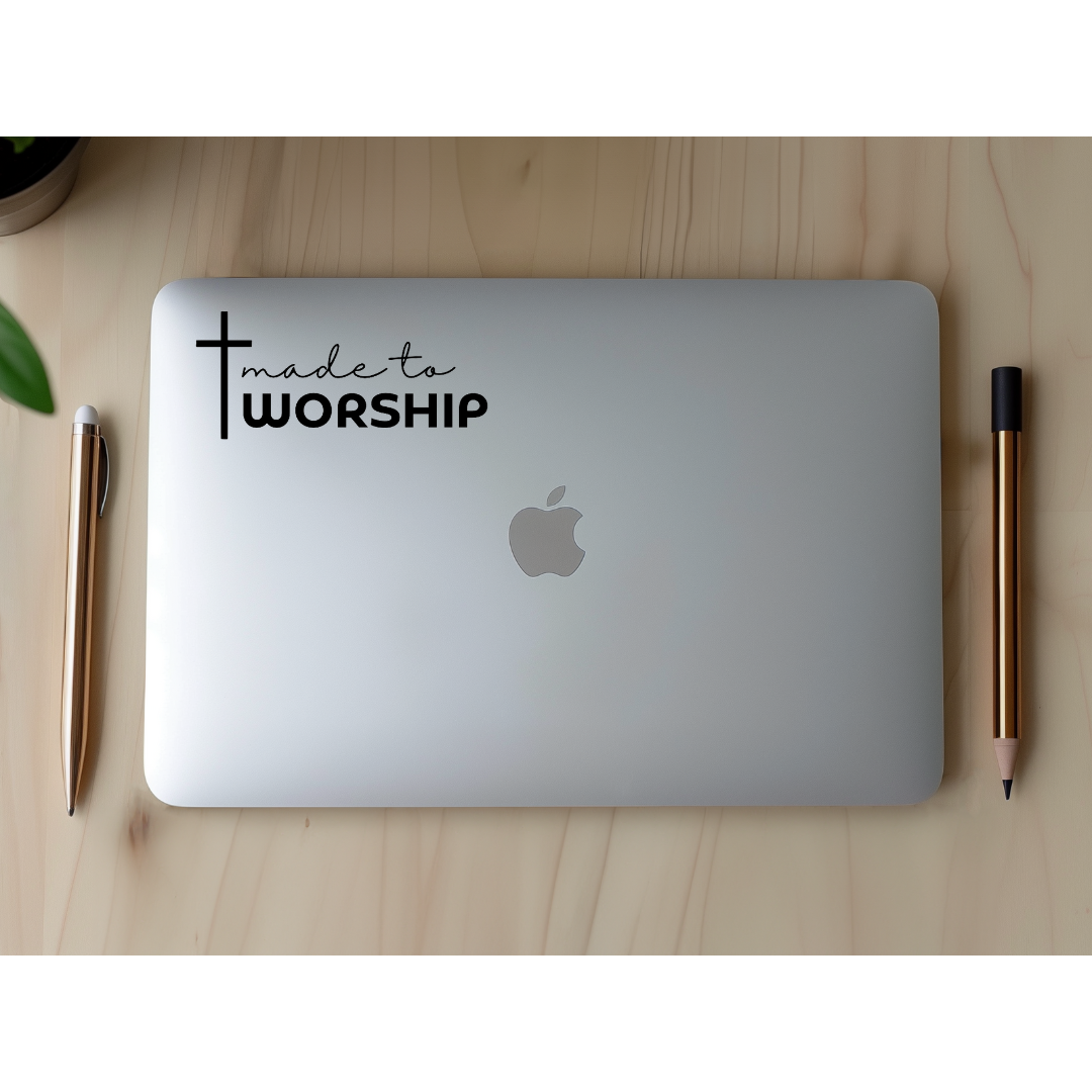 Laptop sticker that says, "made to worship" with a cross on it. 