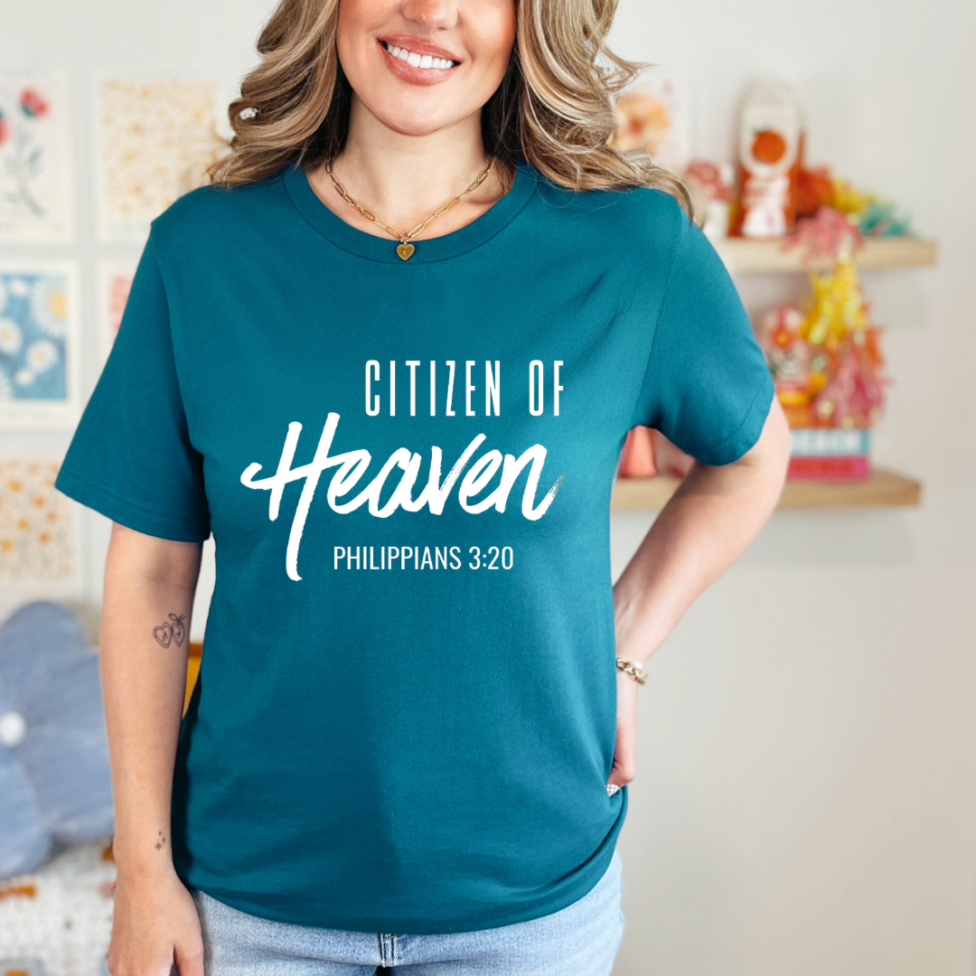 Deep teal crewneck t-shirt that says, "Citizen of Heaven". Underneath in smaller writing it says, "Philippians 3 20."