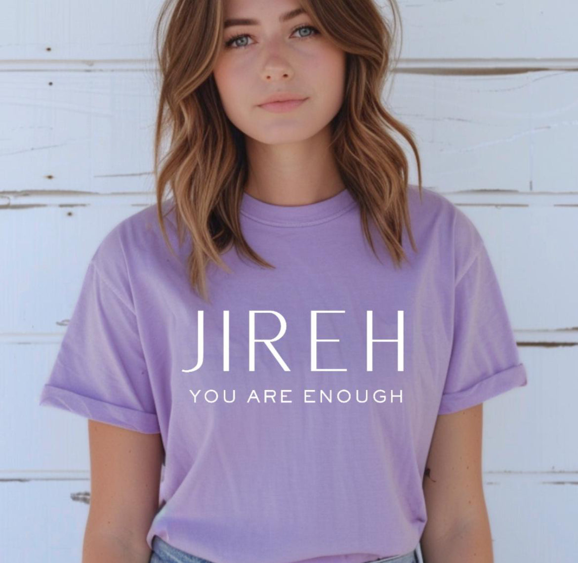 Lavender crewneck t-shirt that says, “jireh” in large letters. Underneath it says, “you are enough.”