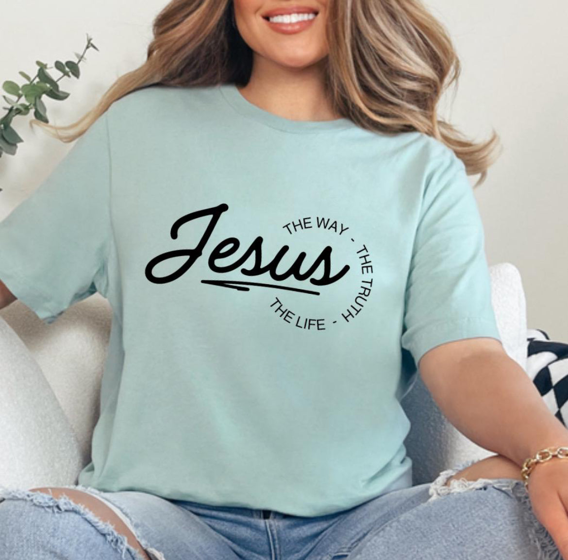 Dusty green crewneck t-shirt that says, “Jesus the way the truth the life.”