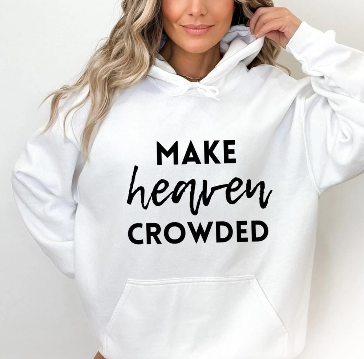 White hoodie that says, "Make heaven crowded."