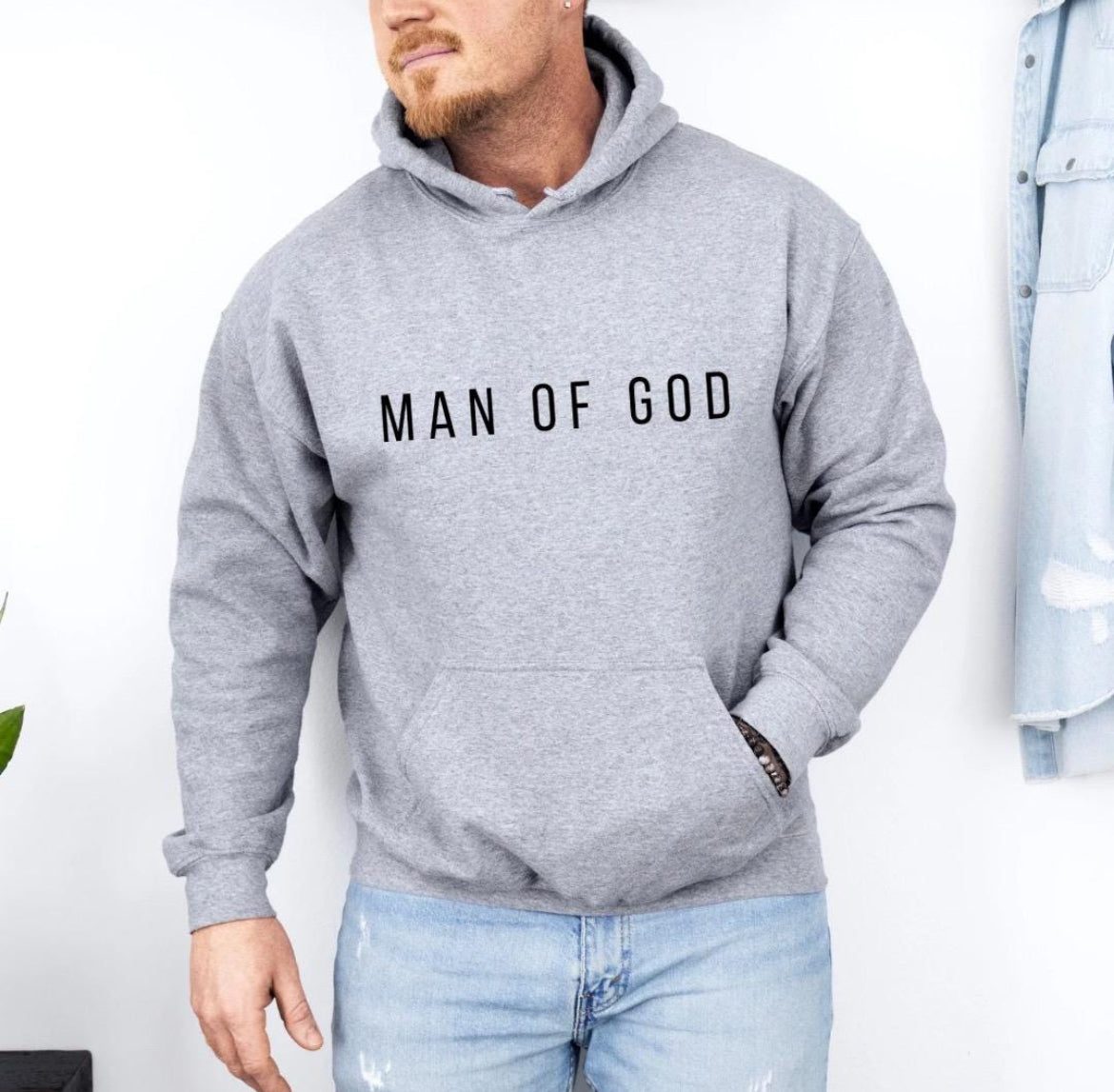 Light gray hoodie that says, "Man of God" in bold letters across the chest.