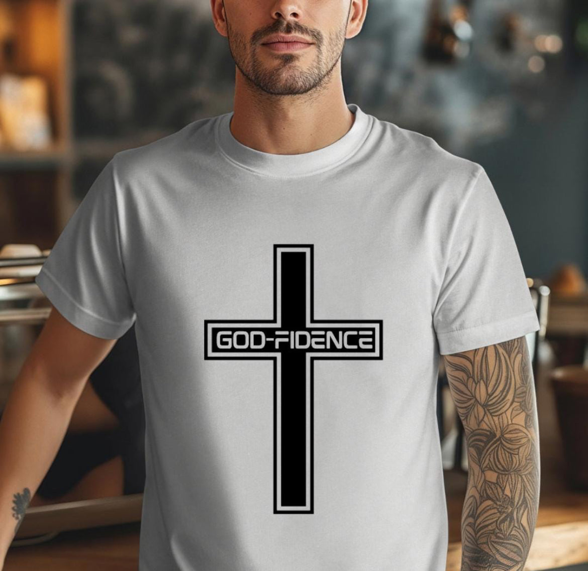 Gray crewneck t-shirt that says, “Godfidence” inside of a cross. 