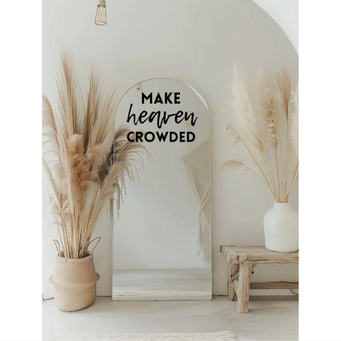 Mirror decal sticker that says, “make heaven crowded.” The word “heaven” is in cursive. 