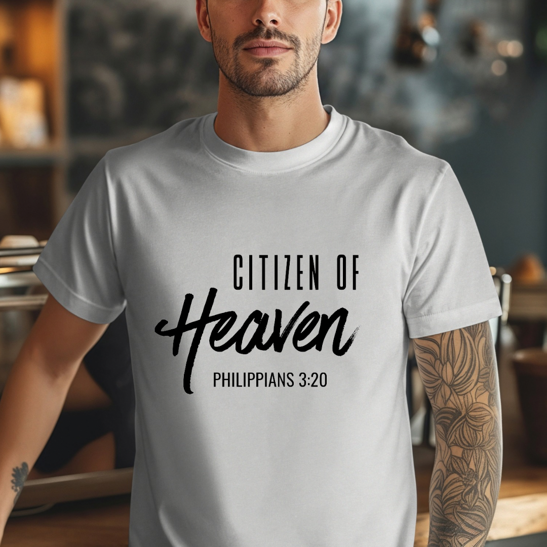 Grey crewneck t-shirt that says, "Citizen of Heaven". Underneath in smaller writing it says, "Philippians 3 20."