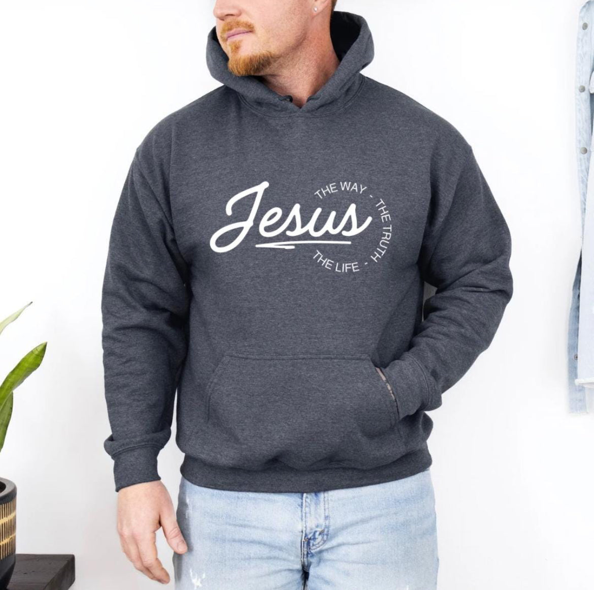 Dark grey hoodie that says, "Jesus, the way, the truth, the life." 