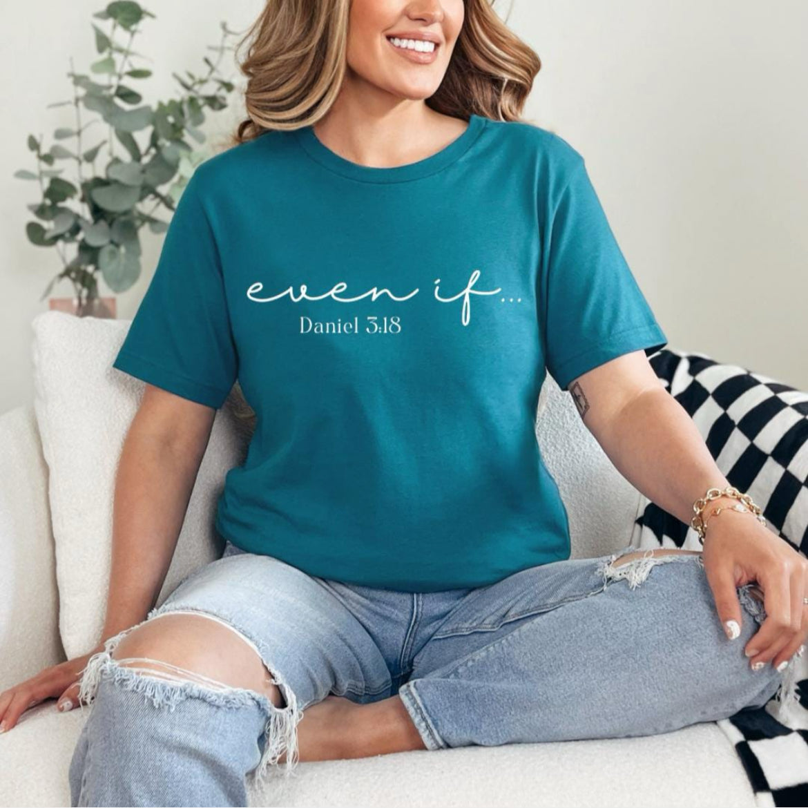 Deep teal crewneck t-shirt that says, “even if…” in cursive letters. Underneath in smaller letters it says, “Daniel 3 18.”