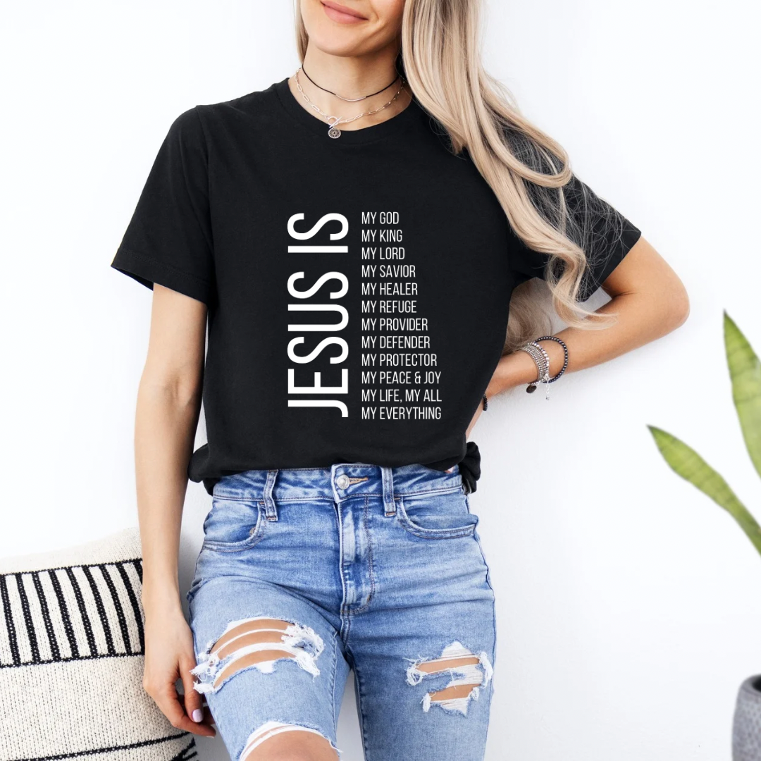 Black crewneck t-shirt that says, “Jesus Is my, God, king, Lord, savior, healer, refuge, provider, defender, protection, peace. joy, life, all, everything.”