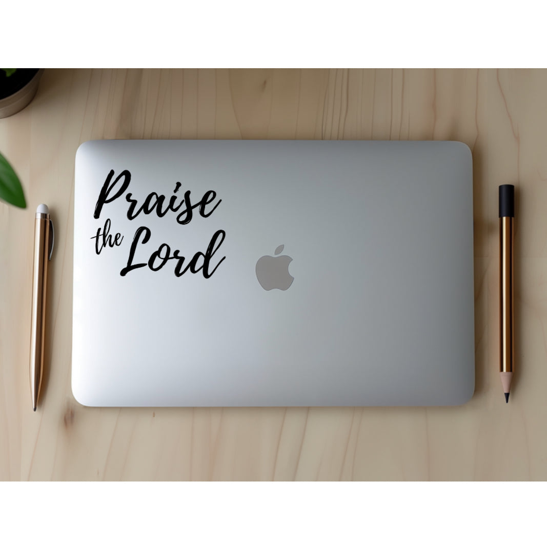 Laptop sticker that says, "Praise the Lord."