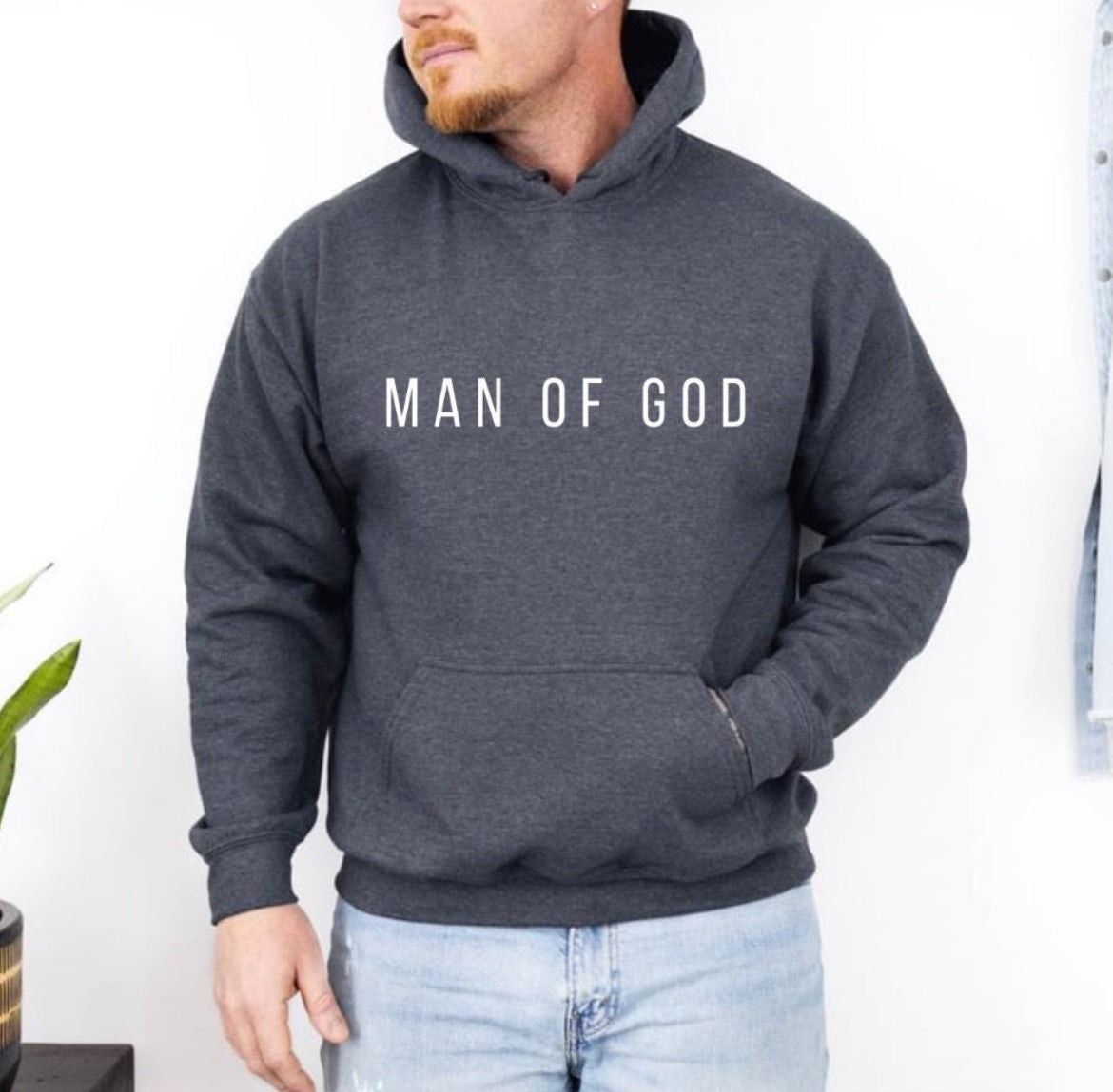 dark grey hoodie that says, "Man of God" in bold letters across the chest.