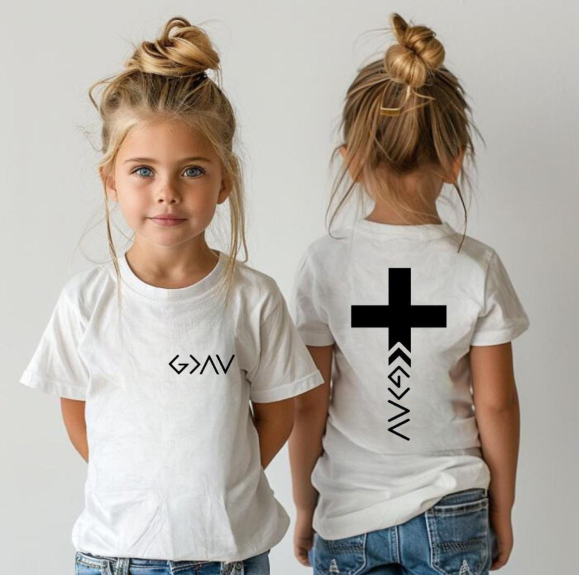 White crewneck t-shirt with a cross on the back that has the symbol “God is greater than the highs and lows” as the bottom part of the cross.  The front has the same symbol in the upper left-hand corner.