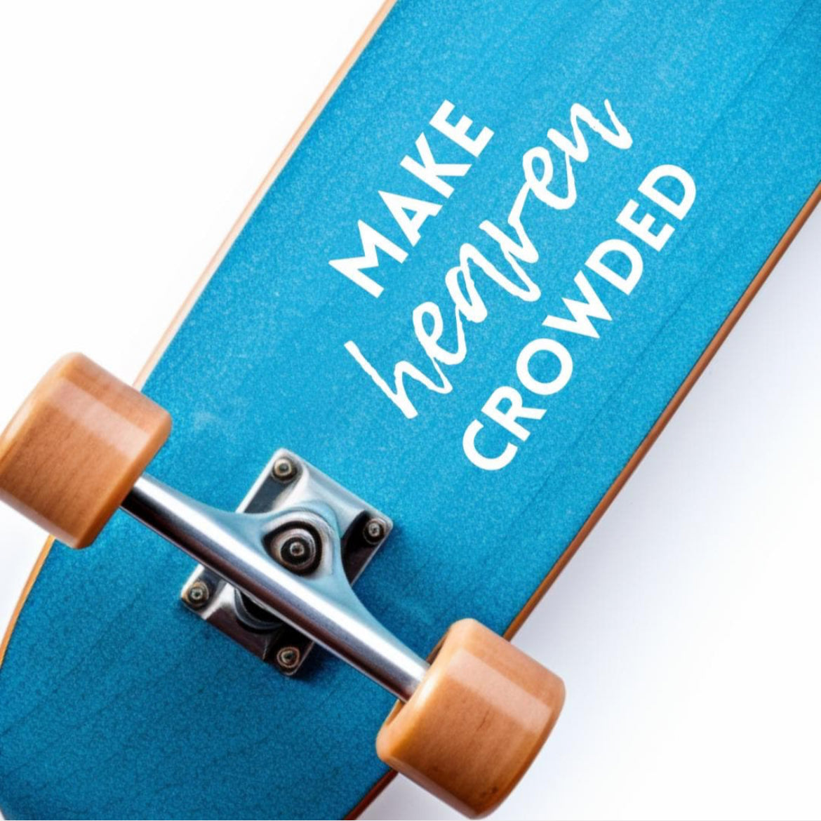 Skateboard decal sticker that says, “make heaven crowded.” The word “heaven” is in cursive. 