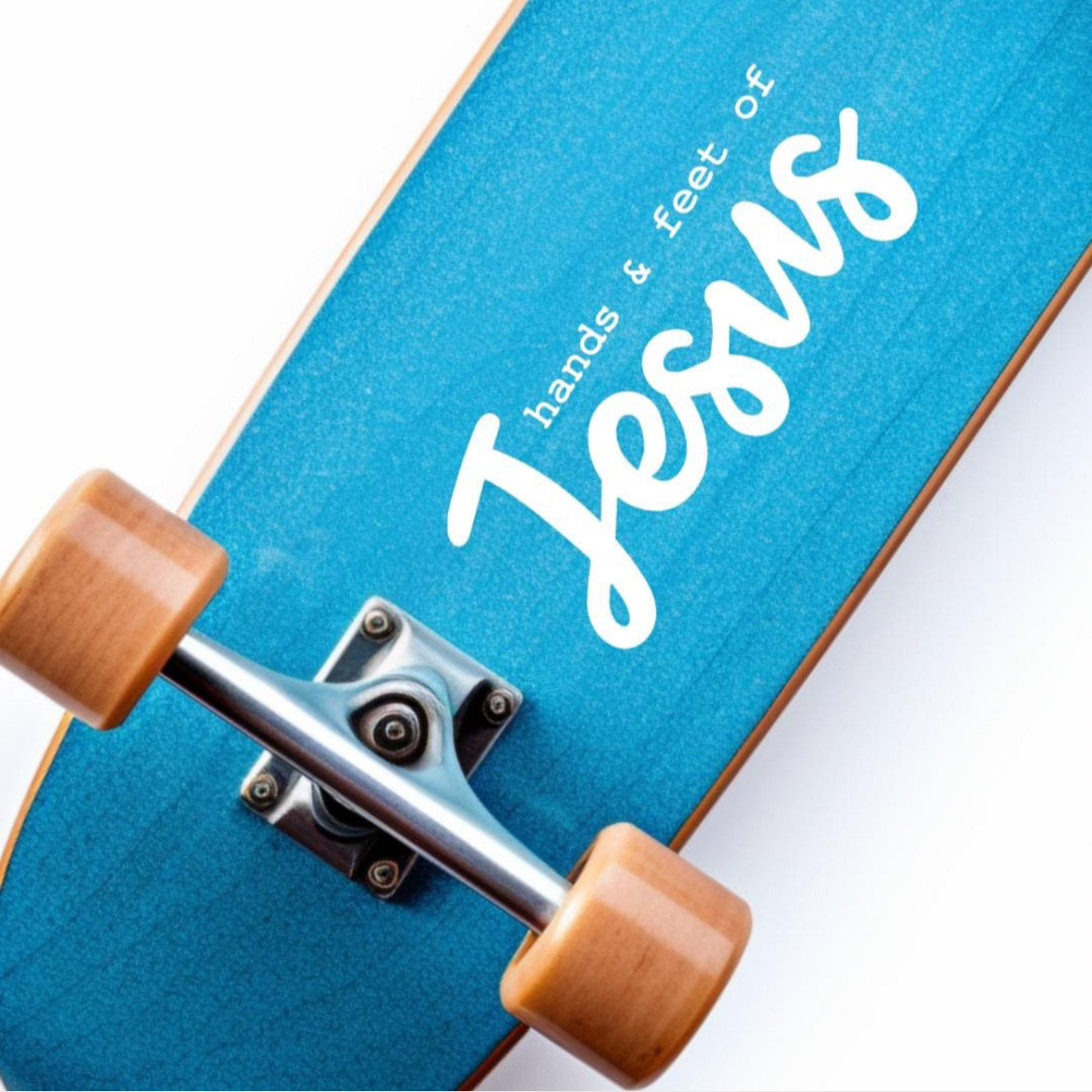 Skateboard sticker decal that says, “hands and feet of Jesus”. The word “Jesus” is in large cursive letters. 