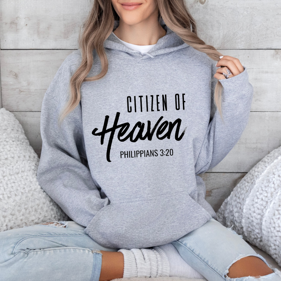 Grey hoodie sweatshirt that says, "Citizen of Heaven". Underneath in smaller writing it says, "Philippians 3 20."