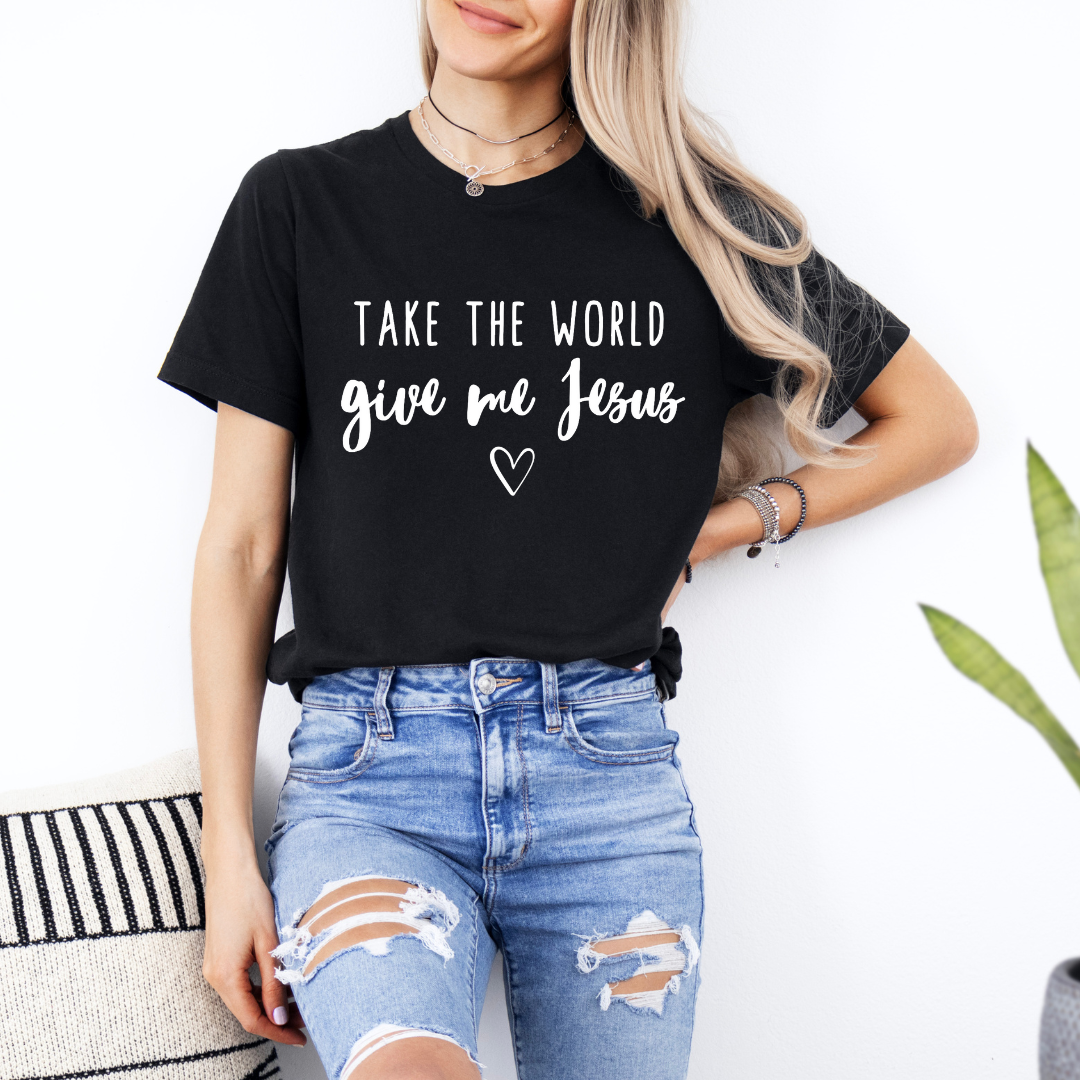 Black crewneck t-shirt that says, “take the world, give me Jesus” with a heart graphic.