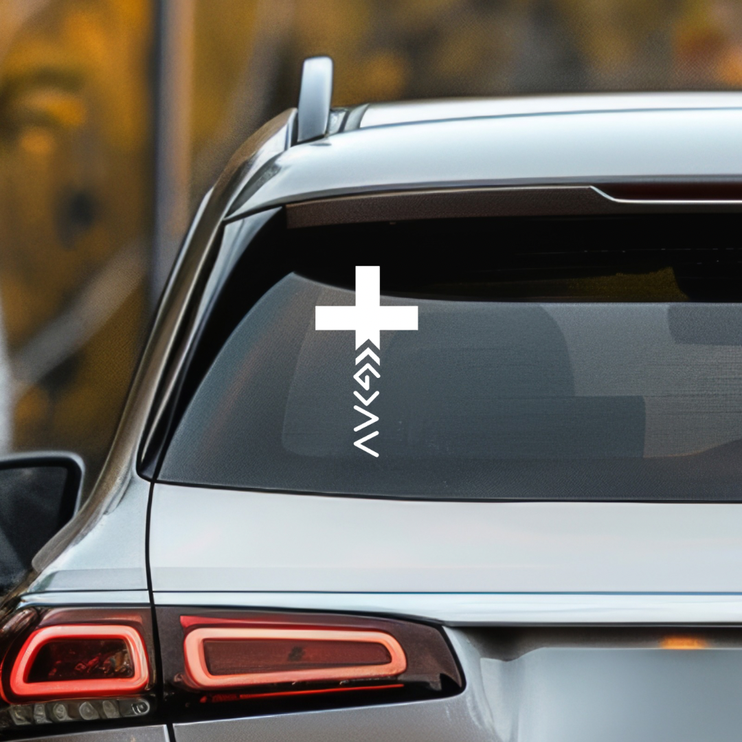 Car decal with the God is greater that the highs and lows cross symbol.