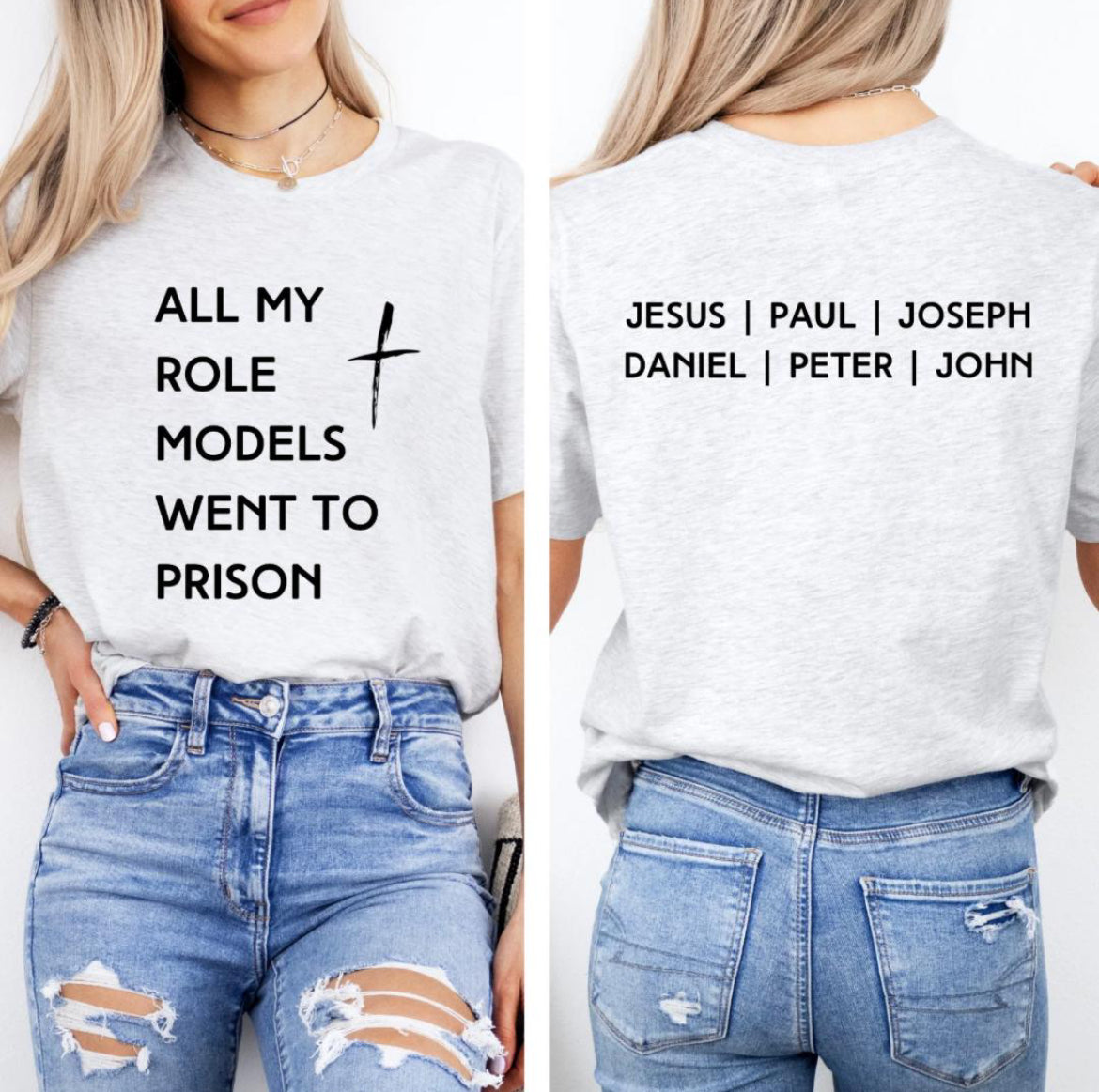 Ash white crewneck t-shirt that says, “all my role models went to prison” with a cross. The back says, “Jesus, Paul, Joseph, Daniel, Peter, John.”