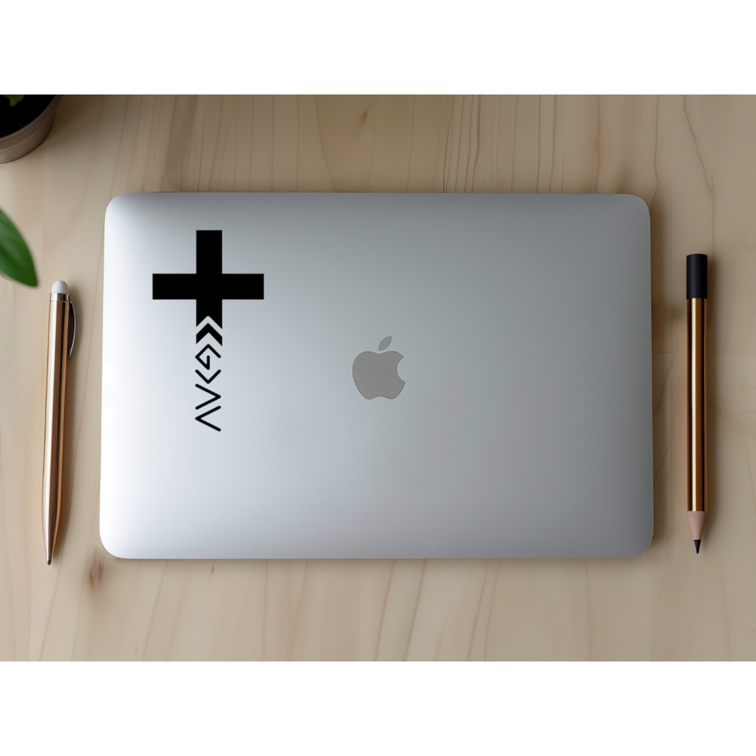 Laptop sticker with the God is greater that the highs and lows cross symbol.