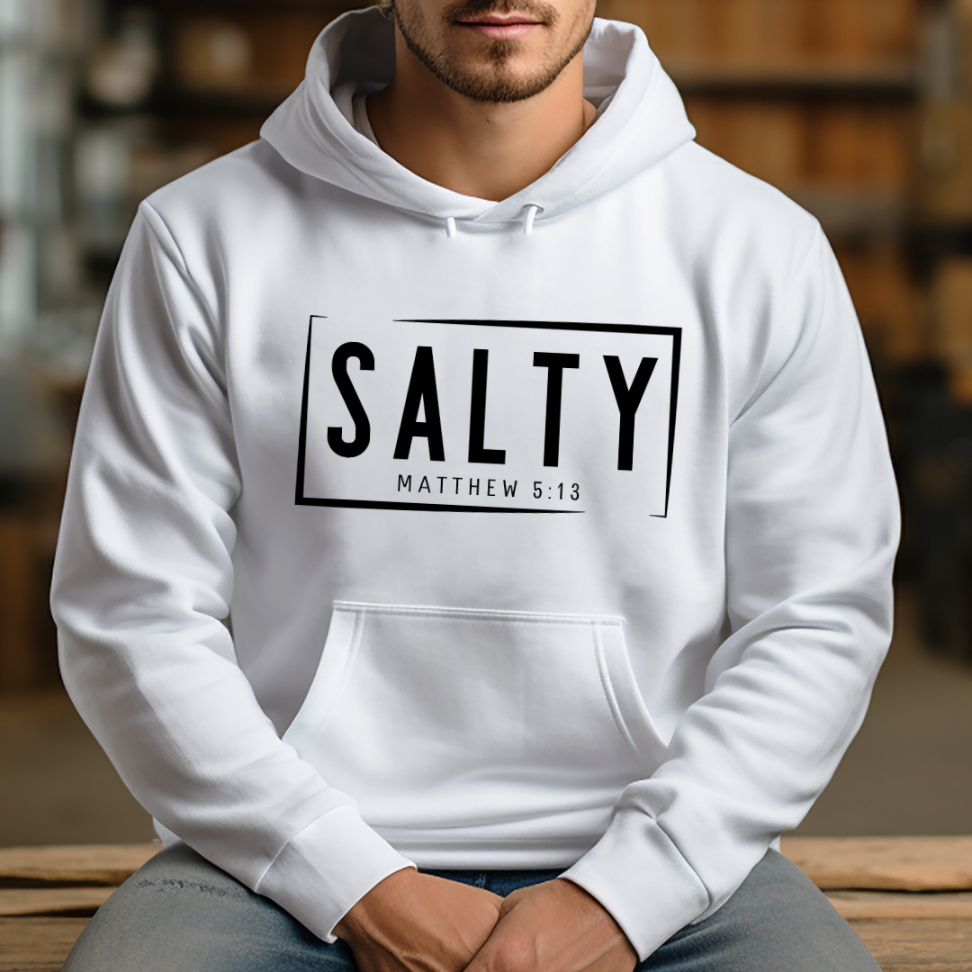 White hoodie sweatshirt that says, “SALTY” in large capital letters. Underneath in smaller letters it says, “Matthew 5:13.”