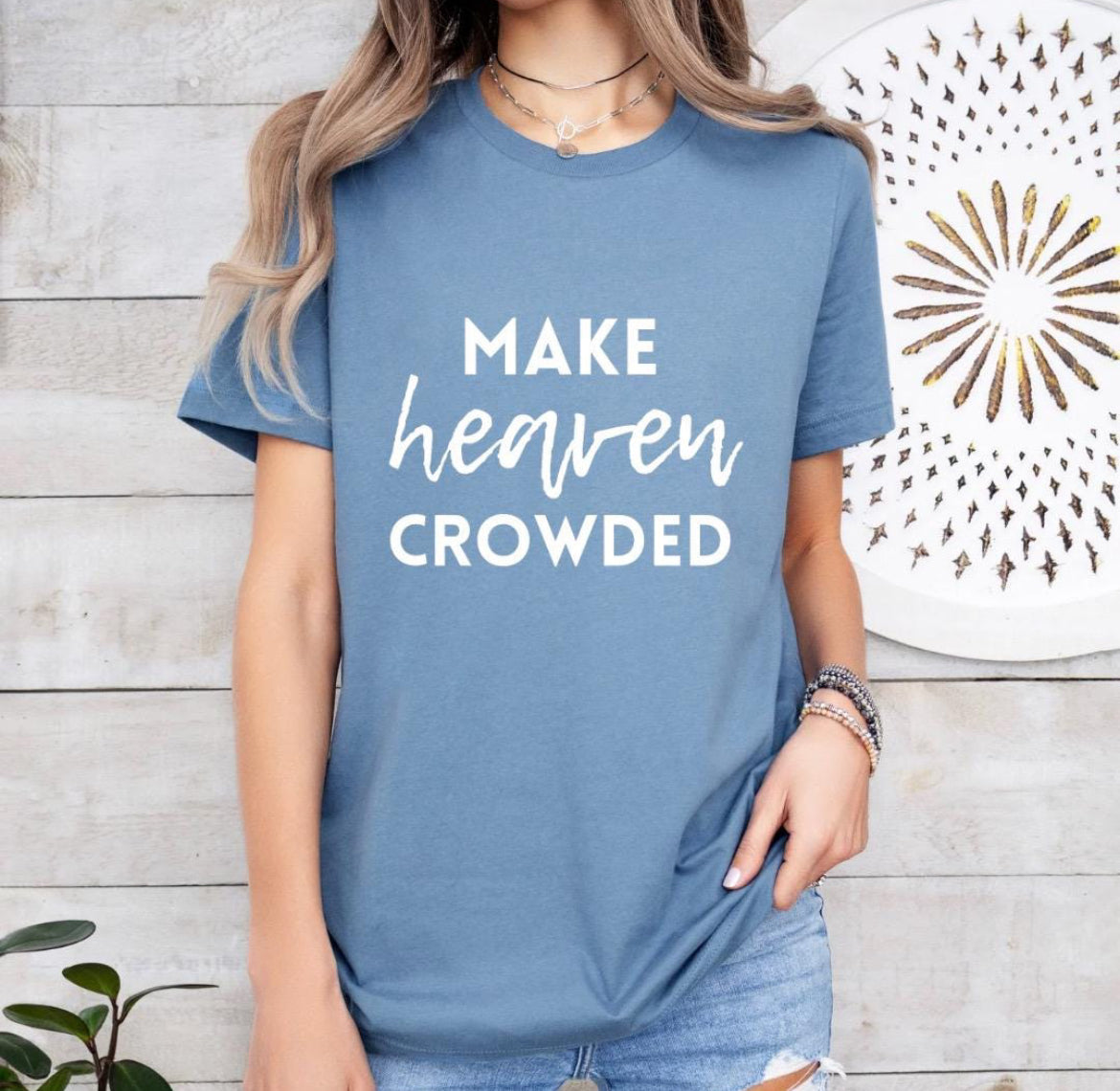 Steel blue crewneck t-shirt that says, “make heaven crowded.”