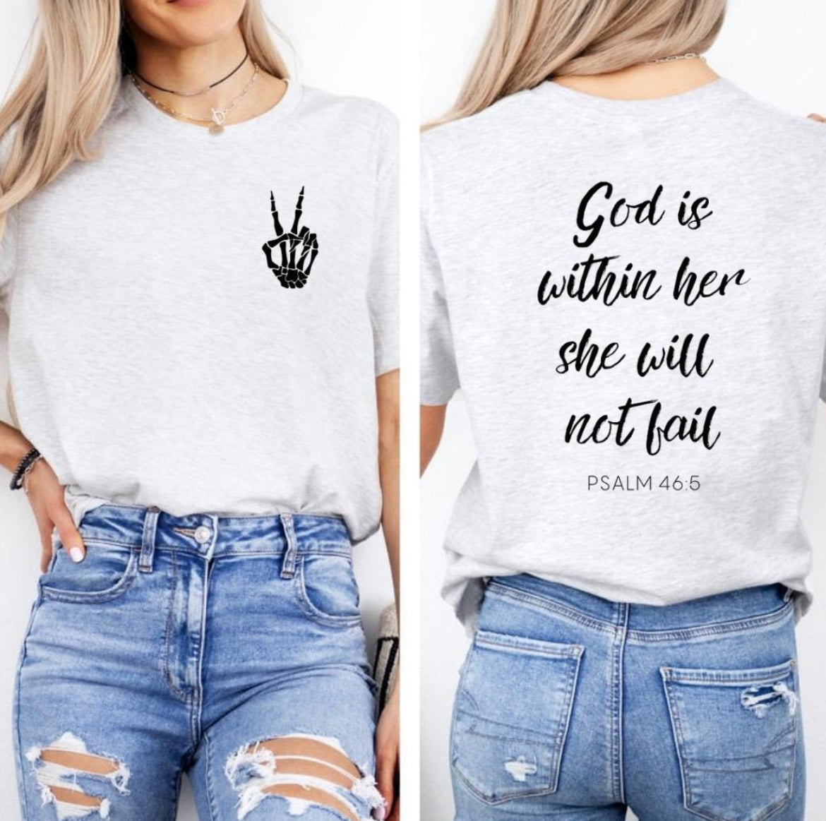 Ash white crewneck t-shirt back that says, “God is within her she will not fail.” Underneath in smaller letters it says, “Psalm 46 5.” The front has a small bones hand peace sign in the upper left-hand corner. 