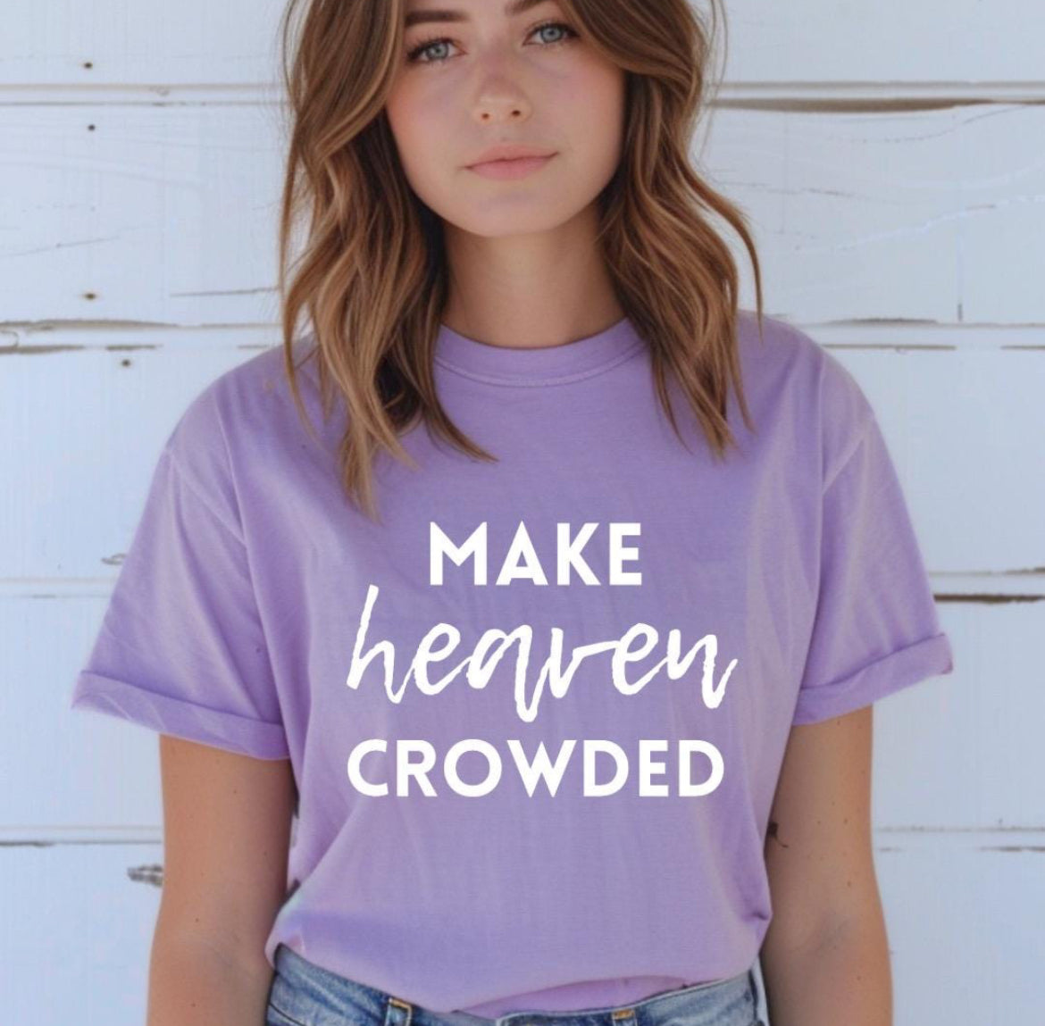 Lavender crewneck t-shirt that says, “make heaven crowded.”