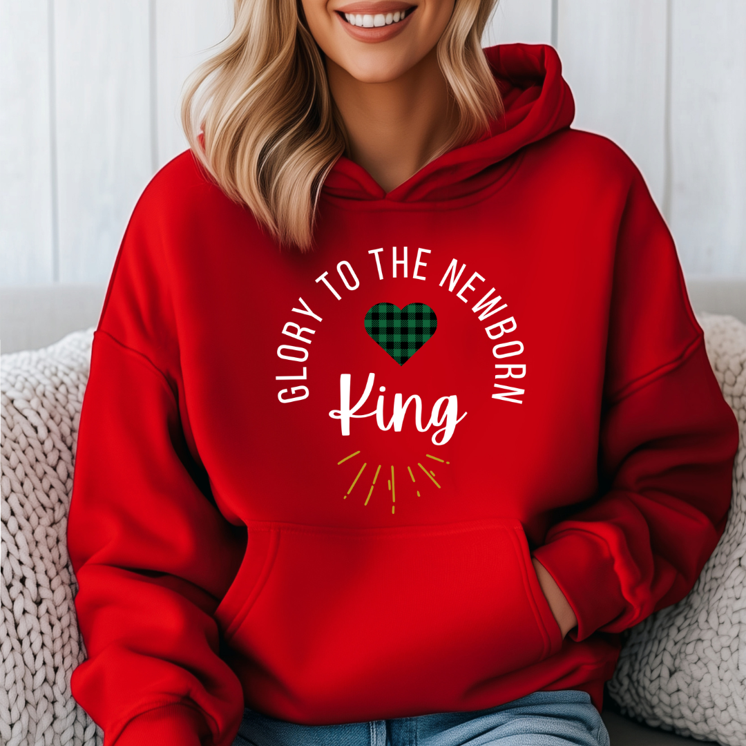 Red hooded sweatshirt that says, "Glory to the newborn King" with gold embellishment and buffalo plaid red heart.