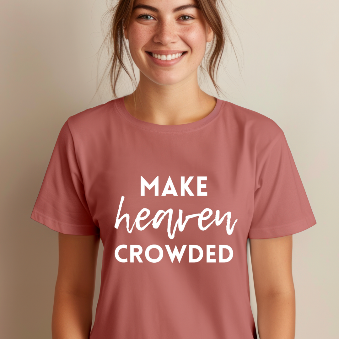 Mauve crewneck t-shirt that says, “make heaven crowded.”