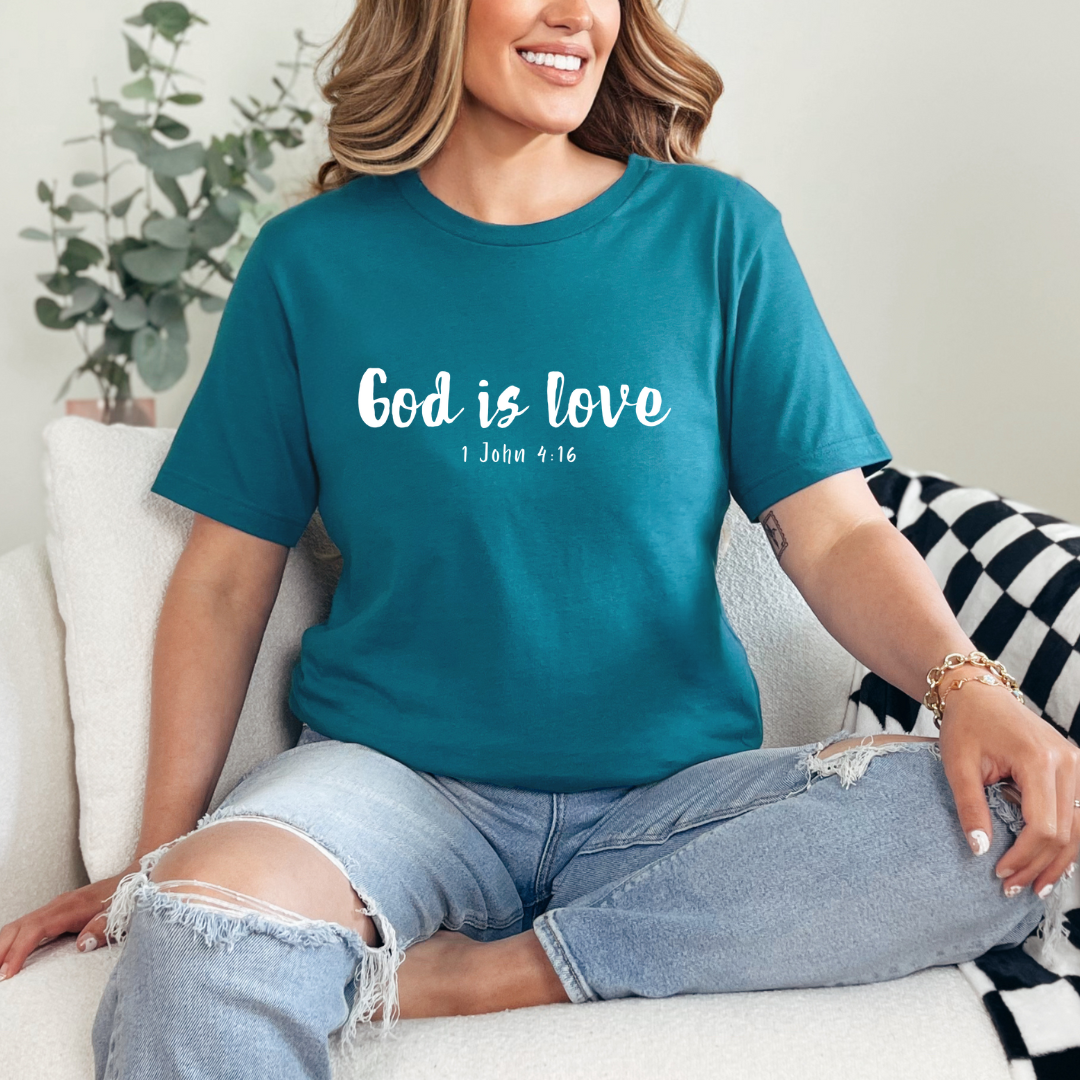 Deep teal Crewneck t-shirt that says, “God is love. 1 John 4:16.” 