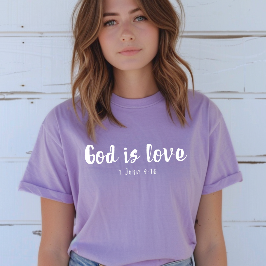 lavender Crewneck t-shirt that says, “God is love. 1 John 4:16.” 