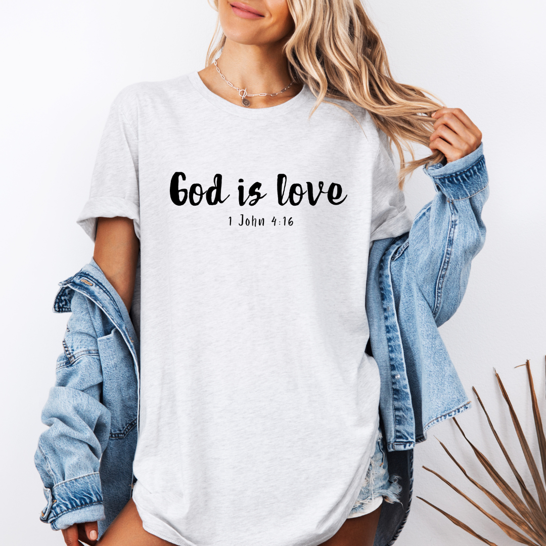 Ash white Crewneck t-shirt that says, “God is love. 1 John 4:16.” 