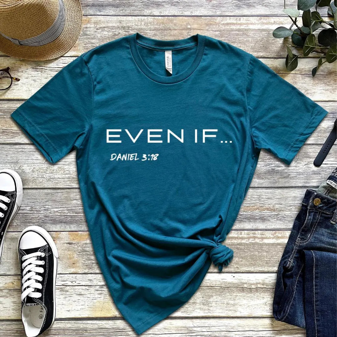 Deep teal crewneck t-shirt that says, “even if…” in large letters. Underneath in smaller letters it says, “Daniel 3 18.”