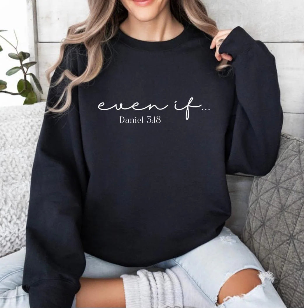 black crewneck hoodie that says, "even if" in large cursive letters. Underneath it says, "Daniel 3 verse 18."